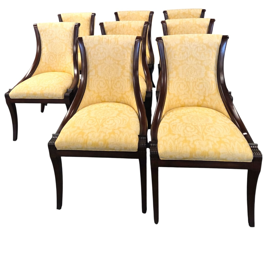 SET OF 8 EMPIRE REVIVAL GONDOLA DINING CHAIRS: Set of eight Empire Revival dining chairs. These were consigned with and are complimentary to the prior lot, which is a fabulous table by Alfonso Marina. Each chair is upholstered in a modern damask p