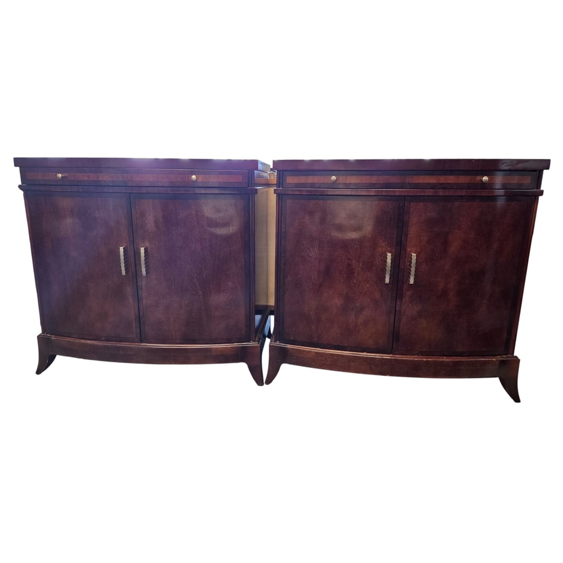 PAIR OF MAHOGANY TWO-DOOR CHESTS / NIGHTSTANDS: A pair of mahogany finished nightstands or chests, with pull out ledge over double doors each enclosing one shelf. Each measures 33" T x 34" W x 18" deep. Minor surface scratches consistent with