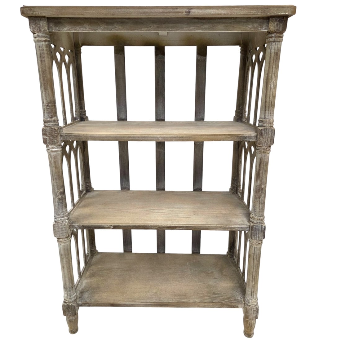 TIERED WEATHERED WOOD BOOKSHELF: A tiered weathered wood bookshelf in a grey driftwood style washed finish. Three shelves. Measures 39.5" H x 14"W. Good condition with minor wear consistent with normal use. SHIPPING NOTE: Live