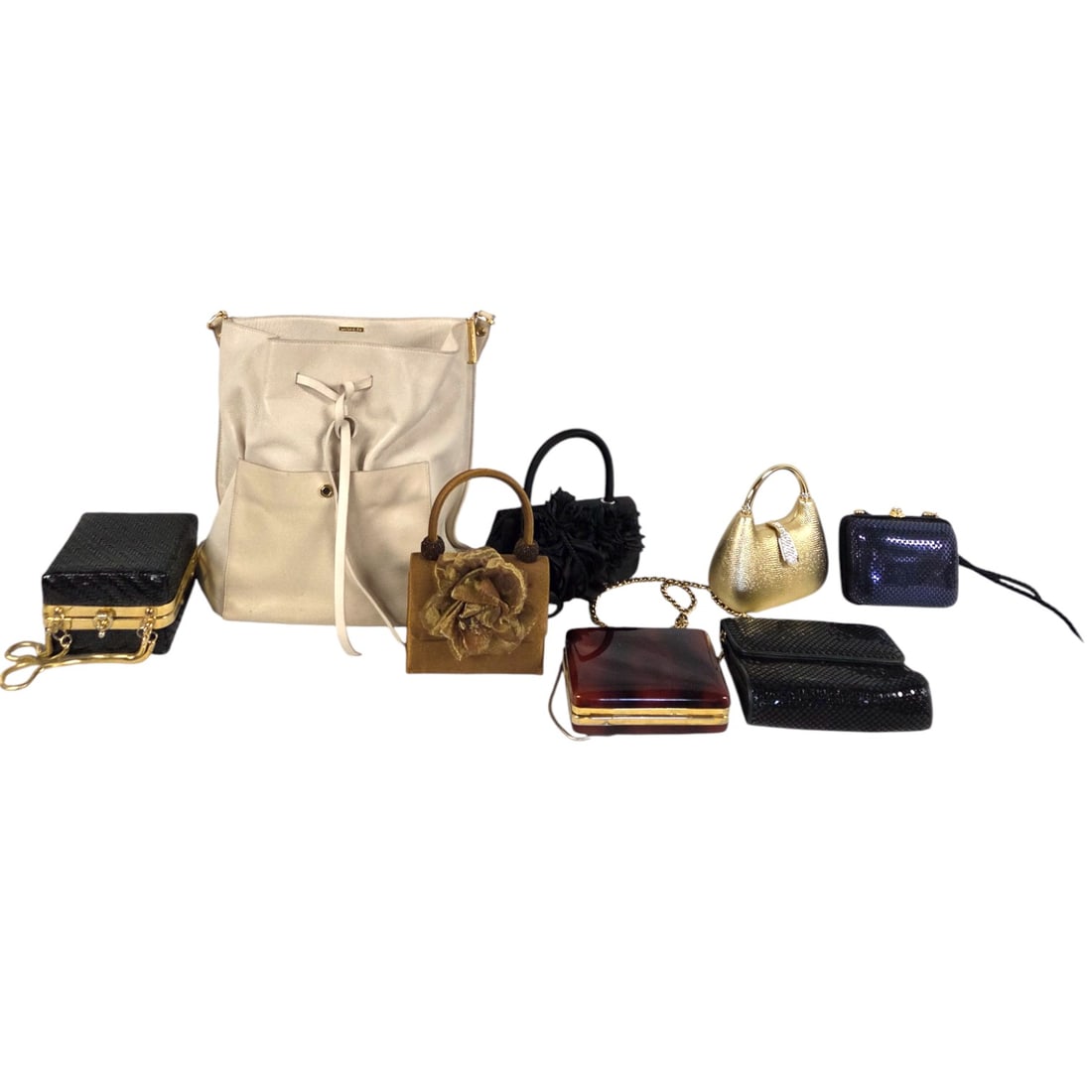 EIGHT ASSORTED WOMEN'S HANDBAGS: A group of seven evening bags and one leather shoulder bag. (1) black satin bag embellished with black flowers. Measures 7" x 3.5", 18" corded strap & satin covered handle. Shows some separation at