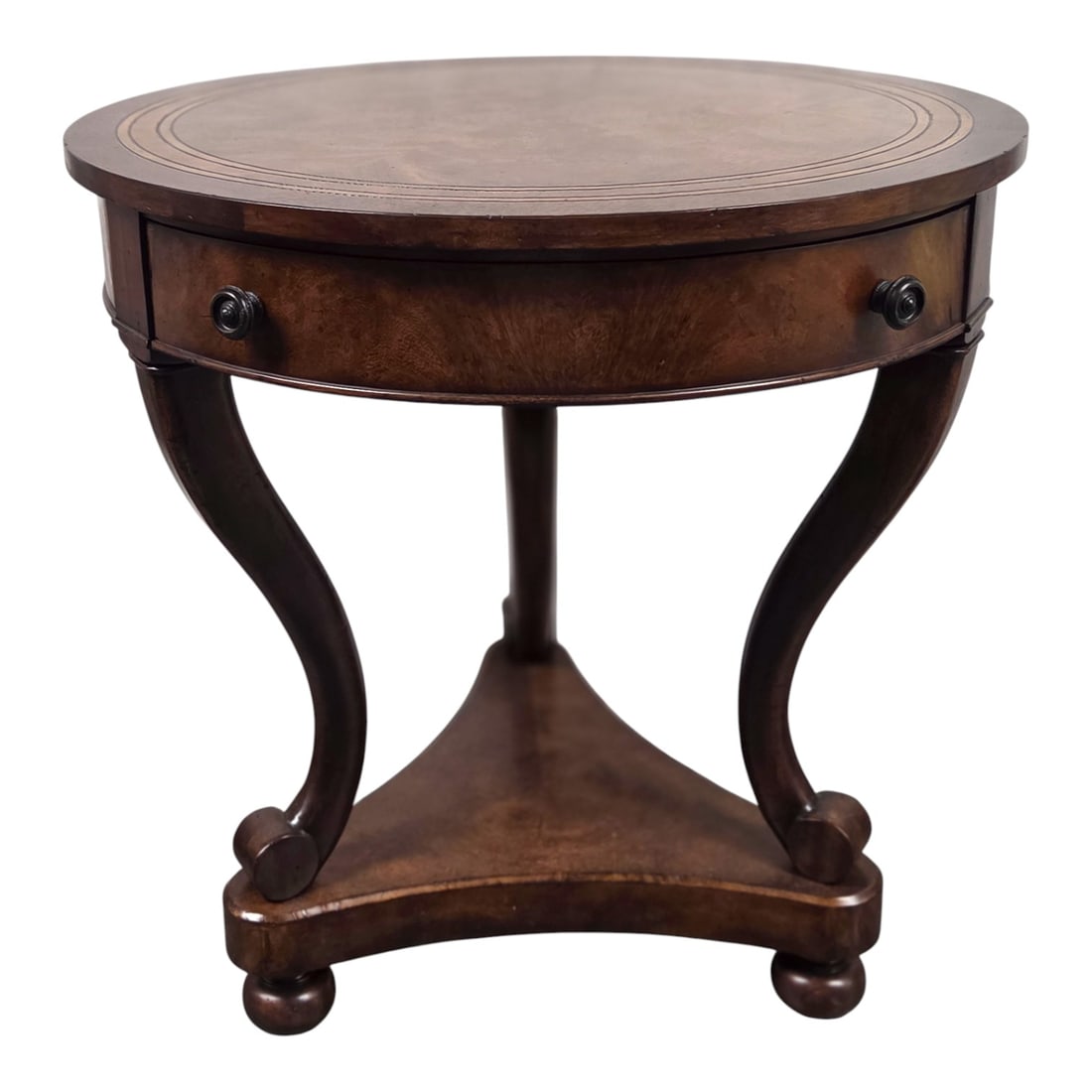 THEODORE ALEXANDER ROUND WOOD TABLE: Theodore Alexander round wood table with single drawer. Inlay top. Measures 26.5" H x 26.0 W" Minor scratches on surface due to age and use. See photos. SHIPPING NOTE: Live Auctioneers offers a very
