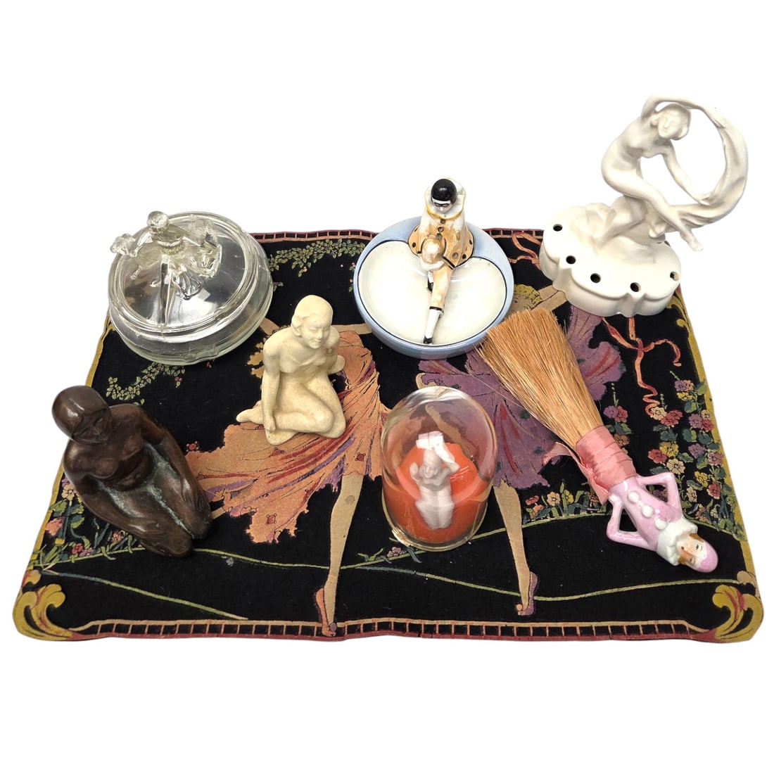 8 PC ART DECO FIGURINES,TRINKET DISHES & FABRIC PC: Eight pieces Art Deco figurines and trinket dishes. Lot consisting of: one kneeling nude woman (zinc based w/ bronze color) ) metal sculpture, one seated ceramic cream colored nude with made in Japan