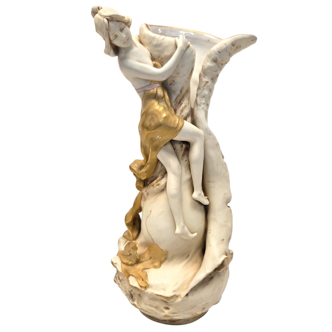 ART NOUVEAU ROYAL DUX VASE WITH MAIDEN: Art Nouveau Royal Dux figural vase with a nude maiden within a gilded wrap on a porcelain vase with folded design, a gilded rim and gilded vine at the base. 16" H x 8" W x 7.5" D. Good condition. Sign