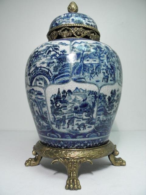 CHINESE BLUE & WHITE BRASS MOUNTED GINGER JAR: Chinese blue and white brass mounted porcelain ginger jar or incense burner. Contemporary makers mark on base. Condition: good, see images. Three pieces total (base, jar, lid), when assembled measures