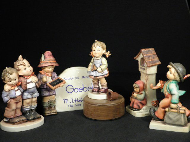 FIVE HUMMEL PORCELAIN FIGURINES: WORSHIP, MERRY WANDERE: Lot of five assorted Hummel figurines. Includes "Merry Wanderer", mould #11/0, tmk 5; "Worship", mould #84/0, tmk 5; "Max and Moritz", mould #123, tmk 2; "Flower Girl", mould #548, tmk 6, exclusive ed