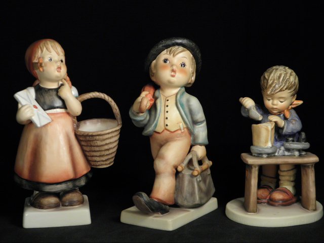 THREE HUMMEL PORCELAIN FIGURINES: MEDITATION, MERRY WAN: Lot of three Hummel porcelain figurines. Includes "A Fair Measure", 5.75" tall, mould #345, tmk 5; "Merry Wanderer", 7" tall, mould #7/I, tmk 3; and "Meditation", 7" tall, mould #13/II, tmk 5. Conditi