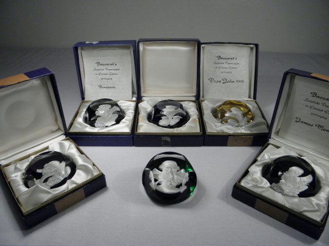 SIX BACCARAT CARVED SULPHIDE CAMEO PAPERWEIGHTS: Lot of six Baccarat carved sulphide cameo paperweights. Includes historical figures such as Pope John XXIII, James Monroe, Napoleon, Patrick Henry, and more. All pieces are signed on base. Condition: