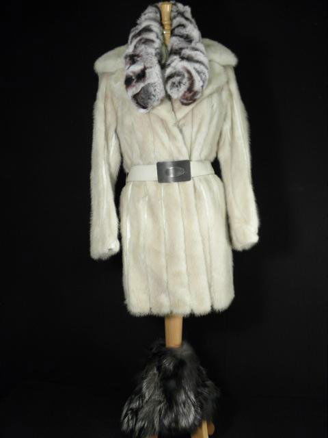ASSORTED FUR: MINK COAT, RABBIT CAPE & COLLAR: Lot of three pieces of assorted fur clothing. Includes a Mink Fur coat by Michael- Worcester, Mass, a Rabbit fur cape by 'cest Simone, and a dyed rabbit fur collar by Four Seasons Hat club. Fur coat c