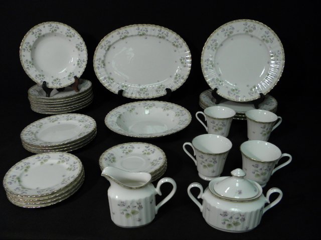 MIKASA "FRENCH VIOLETS" PORCELAIN DINNERWARE: 32 PCS: Mikasa "French Violets" porcelain dinnerware. Includes 32 pieces: (4) 10.75" dinner plates, (8) 9" soup bowls, (4) 6.5" plates, (4) 6" saucers, (4) 3.25" tall cups, (4) 8.4" salad plates, (1) 10.25" l