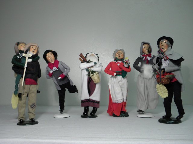 SIX BYERS CHOICE CAROLERS: HAPPY SCROOGE, ETC.: Lot of six Byers Choice caroler figures. Each limited edition signed on base. Includes figures such as Bob Cratchett and Tiny Tim, Happy Scrooge, etc. Condition: generally good, see images. Each figur