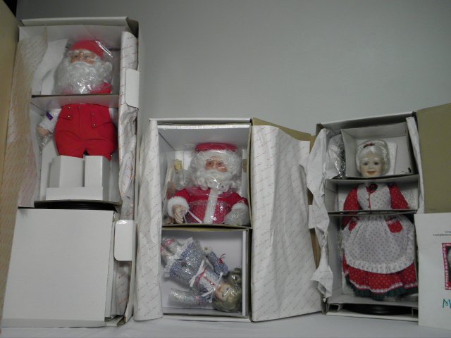 DANBURY MINT SANTA CLAUS & MRS CLAUS FIGURES: Lot of three Danbury Mint Christmas figures. Includes "A Visit with Santa" display, "Santa Claus at his Workbench", and "Mrs. Claus". Condition: good, all are boxed in original boxes with paperwork, s