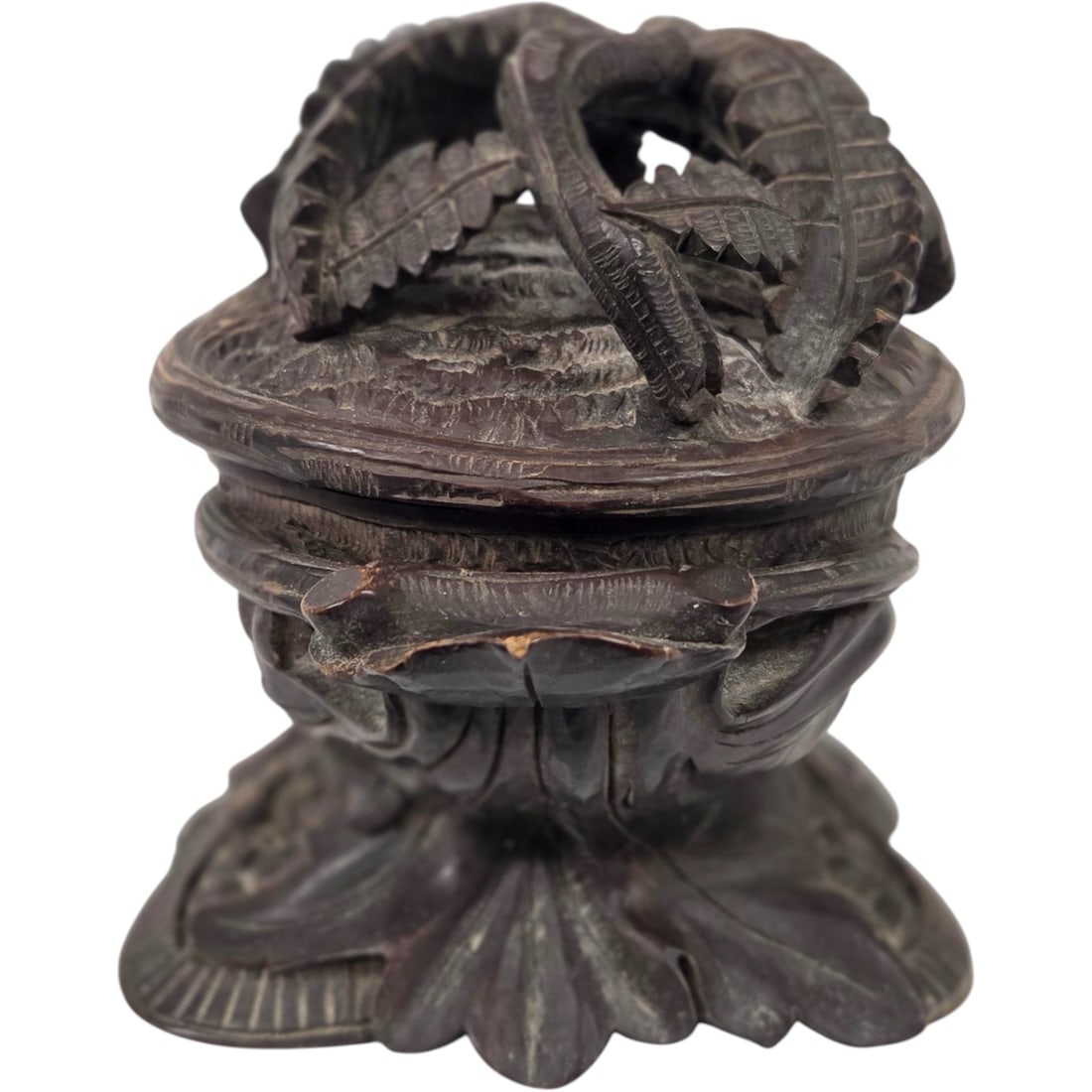 BLACK FOREST FOLK ART / TRAMP ART CARVED BOX 19C: Antique Black Forest Carved Wood Trinket Box, late 19th century. This oval-form jewelry or dresser box is carved from lindenwood and finished with a dark, rich walnut stain. The hinged dome lid featur