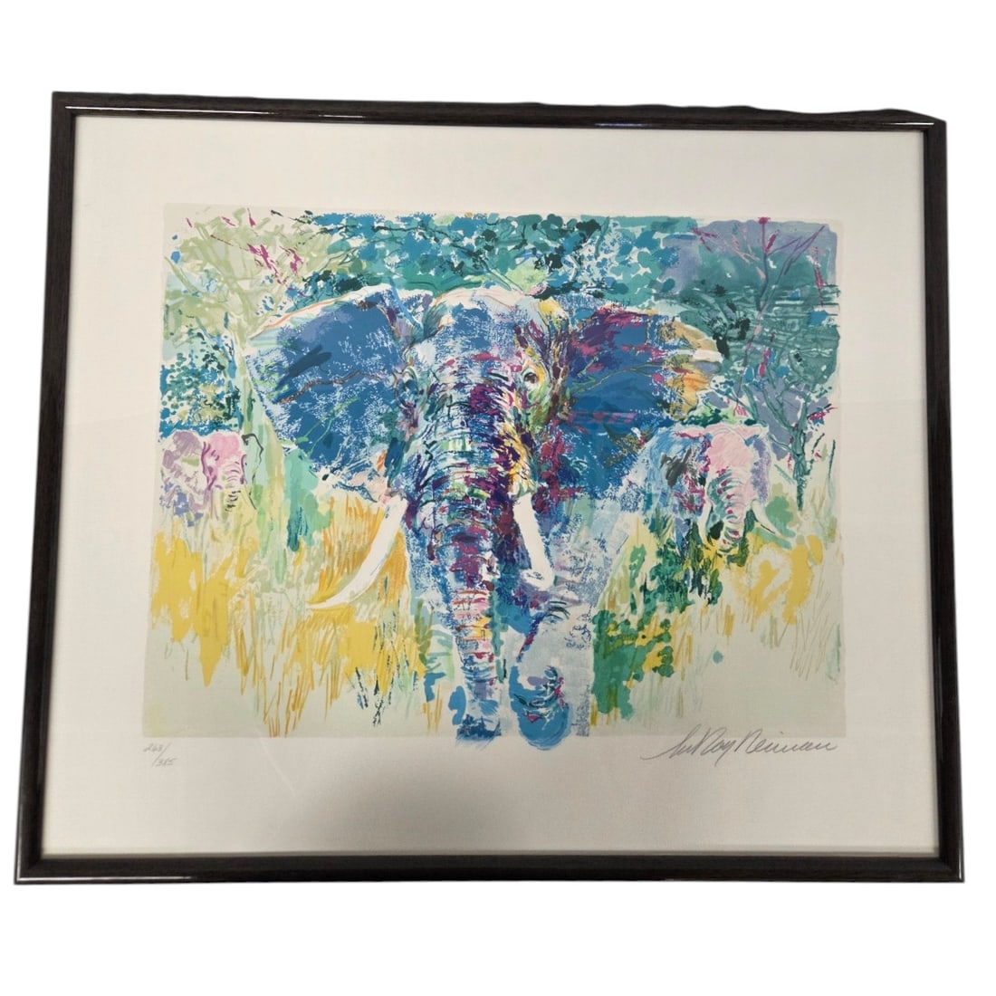 "BULL ELEPHANT" L.E.SERIGRAPH BY LEROY NEIMAN: Bull Elephant Limited Edition 263/385 Serigraph by Leroy Neiman. From the Safari Suite Series published in 1997. Signed lower right. Image size 17.5 H x 23 W. Outside size 26 H x 30.5 . Under glass wi