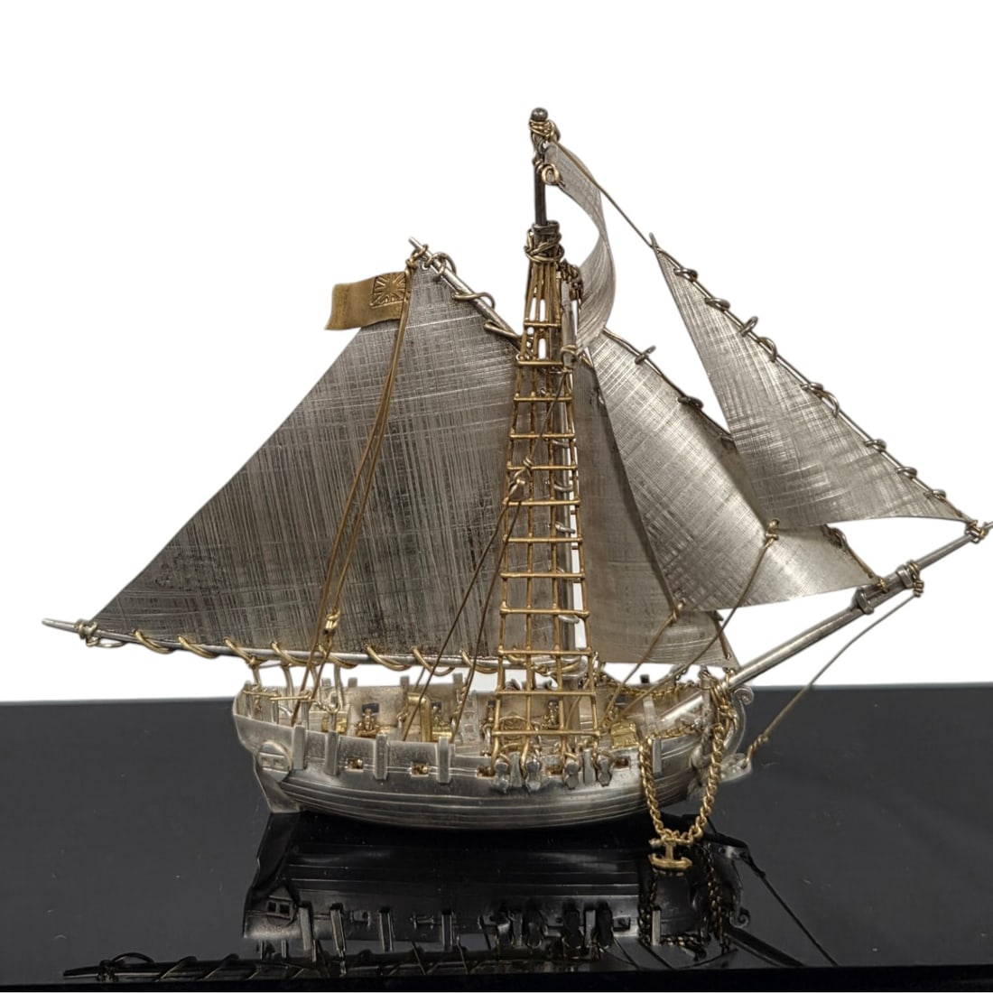 "FERRET" SMALL STERLING SILVER L.E. SHIP BY JANNA THOMAS: Ferret limited edition #31/200 sterling silver miniature British ship by designer Janna Thomas de Velarde from Taxco, Mexico. Janna was internationally know for her silver work and previously designed