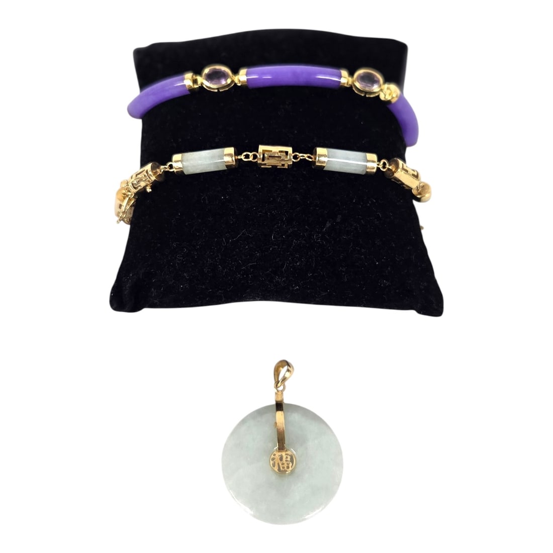 3 PC 14 KT YELLOW GOLD LAVENDAR & CELEDON JADE JEWELRY: Three piece estate lot consisting of: 1) an 8 long bracelet with 4 cylindrical celedon green jade segments capped with gold and interconnected by relief-cast Chinese character link bars. Secured with