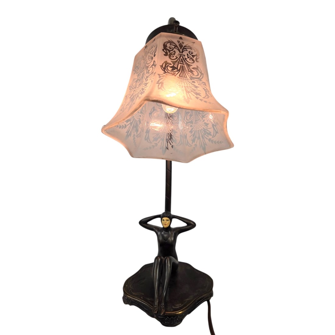 VINTAGE DAV-ART NEW YORK ART DECO LAMP: Dav-Art New York Art Deco table lamp. Woman figure sitting on base wearing a vintage bathing suit with arms raised. Metal fixture has arched gooseneck arm with decorative frosted bell-shaped glass sha