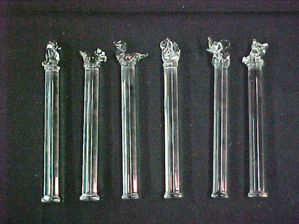 SIX ASSORTED CRYSTAL MUDDLERS STIRRERS: SIX ASSORTED CRYSTAL MUDDLERS STIRRERS Set includes an Elephant, Swan, Penguin, Pig, Dachshund and Squirrel. All are 4 3/4" long. The squirrel has a broken tail. All others are in very good condition.
