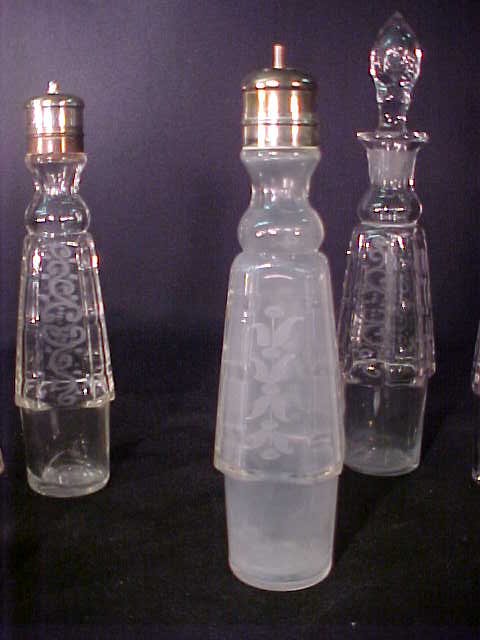 SILVER PLATE ANTIQUE CRYSTAL CASTER SET - 9