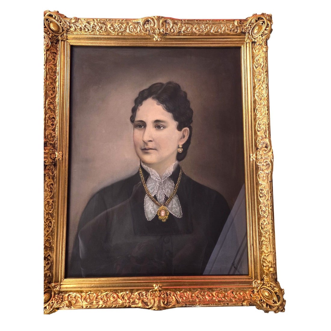 PORTRAIT OF A WOMAN IN PASTEL & CHARCOAL: Late Victorian era Portrait of a Woman pastel featuring a likely wealthy woman or matriarch wearing a high- collared black silk or velvet dress typical of formal fashion at that time. She is adorned w