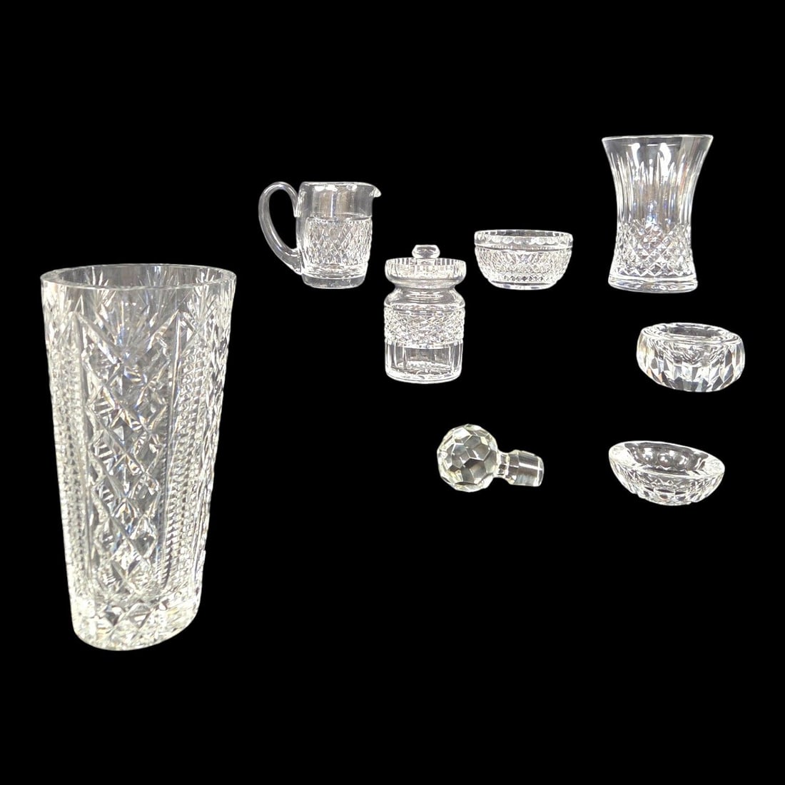 8 PIECE GROUPING OF VINTAGE FINE CUT CRYSTAL - VASE, CREAMER, SUGER, ETC.: Eight piece collection of vintage fine cut crystal consisting of: two (large and small) Waterford vases, two trinket dishes, one Waterford small bowl, one Waterford creamer pitcher, one mustard (or su