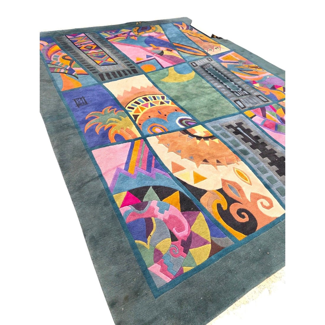 YSSIMA COLORFUL ABSTRACT AREA RUG 10' X 14': Yssima area rug designed by Nini Ferrucci. Yssima is a prominent European luxury textile label known for manufacturing high-art designer carpets during the 1990s. This rug features bold geometric colo