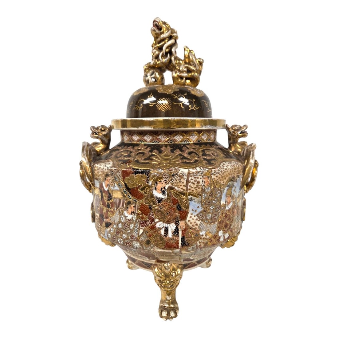 JAPANESE MEIJI COVERED INCENSE BURNER W/FOO DOG FINIAL: Japanese Meiji period (1868-1912) porcelain incense burner with a dark glaze and gold decoration. The lid is surmounted by a Foo Dog finial with it paw resting on a pierced sphere. Warrior figures