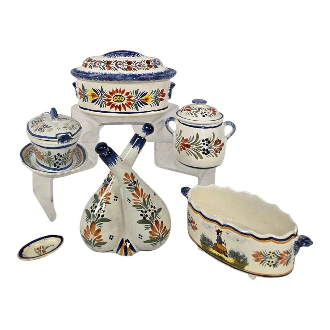6 PC ASSORTMENT OF FRENCH QUIMPER FAIENCE TABLEWARE: 6 piece assortment of vintage French Quimper faience tableware. Lot consisting of: covered tureen with side handles and lid measuring 4 H x 8 W x 6 D, Gravy boat with lid and undertray 3.5 H x 5.25 W