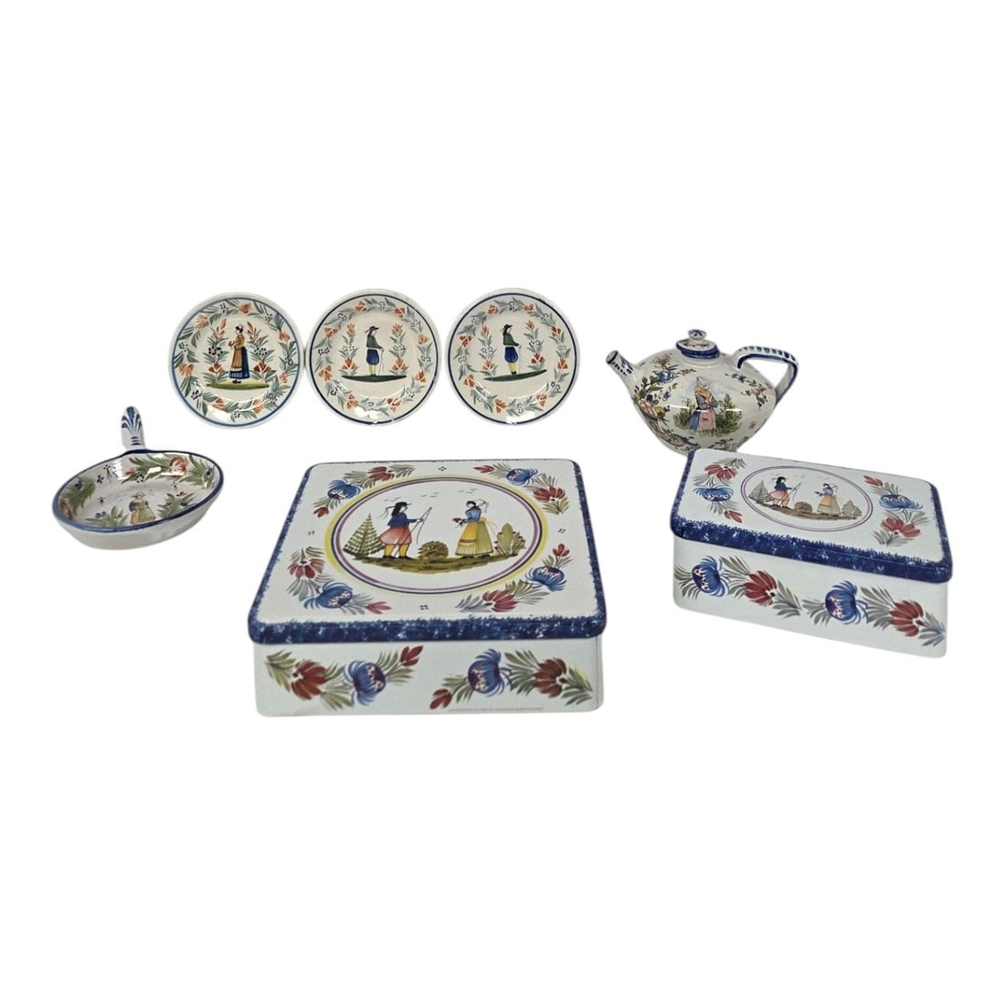 7 PC LOT OF FRENCH QUIMPER FAIENCE ITEMS: 7 piece lot of French Quimper faience design items consisting of: 2 metal rectangular tins measuring 2.75 H x 9 W x 9 D and 2.75 H x 7.5 W x 5 D, one small handled pottery dish measuring 1 H x 9 W, 3