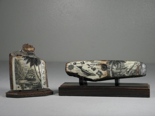 TWO PETER KINNEY CARVED WALRUS IVORY SCRIMSHAWS: Lot of two 20th century Scrimshaw carvings by Peter Kinney. Both on fossilized Walrus ivory slabs. The first scrimshaw etching is on an ancient fossilized walrus ivory fire starter/chisel, and depicts