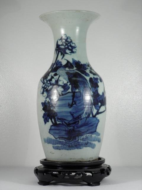 19TH C CHINESE BLUE & WHITE GLAZED PORCELAIN VASE: A 19th century Chinese blue and white glazed wide-mouth vase. Unmarked except for later paper label on base. Includes carved wood stand. Condition: minor flea bites and signs of age to glaze, see imag