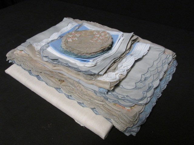 ASSORTED HAND STITCHED & EMBROIDERED LINENS: Lot of assorted hand stitched and hand embroidered linens, placemats, coasters, doilies, etc. Largest mats measures approximately 20" long. Total weight: 3 lbs.