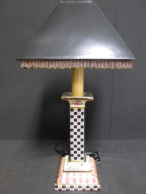 MACKENZIE CHILDS "TORQUAY" CANDLESTICK STYLE LAMP: Mackenzie Childs "Torquay" candlestick style table lamp with a black tasseled shade. Condition: good, see images. Measures a total of 19" tall. Lamp measures 16" tall to top of socket, shade measures 