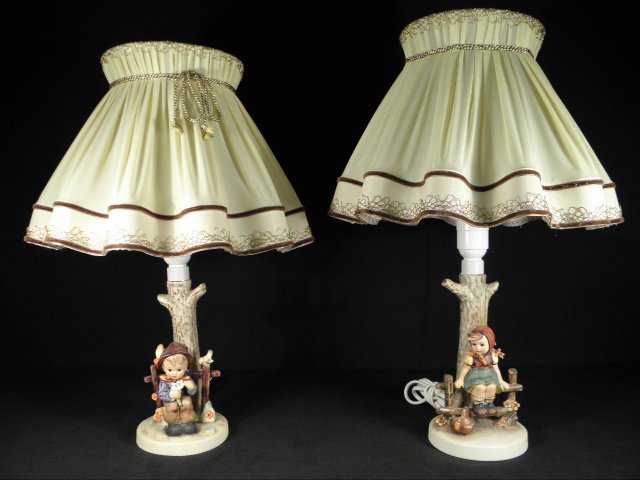 TWO HUMMEL PORCELAIN TABLE LAMPS: JUST RESTING, SHE: Lot of two Hummel German porcelain table lamps. Includes "She Loves Me, She Loves Me Not", mould # 227, trdmk 5; and "Just Resting", mould #225/I, trdmk 5. Each measures approximately 7" to top of por