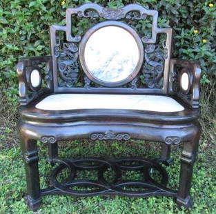 19TH C CHINESE ROSEWOOD ARMCHAIR WITH MARBLE INLAY: A late 19th century Chinese carved rosewood bench with landscape marble inlay at the seat, sides, and back. Condition: repair to both skirt side panels, marble inlay on the seat is cracked in two plac