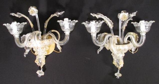 PAIR VENETIAN FLORAL ART GLASS SCONCES: Pair Venetian floral art glass sconces with gold flecking throughout. Each sconce has two arms and various floral inserts. Condition: good, no chips or cracks, sconces may need re-wiring prior to use 