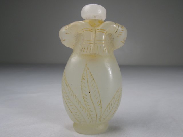 ANTIQUE CHINESE CARVED FACES SNUFF BOTTLE: ANTIQUE CHINESE HAND CARVED WHITE JADE TWO FACES SNUFF BOTTLE WITH LID - MEASURES 2.75" X 1.5"