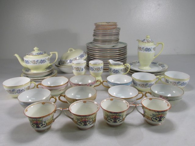 ASSORTED FLORAL PORCELAIN WARE: ROYAL WORCESTER, ETC.: Lot of assorted floral porcelain ware. 56 total pieces including Noritake, Royal Worcester and many more, mostly hand painted. Condition: minor wear to some pieces, no chips or cracks, see images. Tot