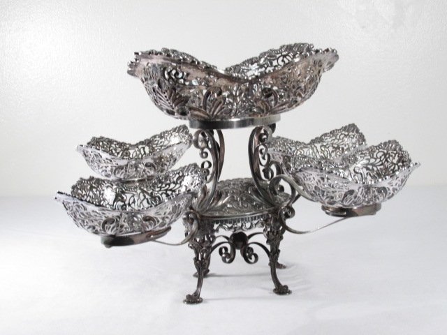 ANGELETTI STERLING SILVER FIVE BASKET EPERGNE - 80: Italian reticulated sterling silver five basket epergne by Angeletti, Roma. Large central detachable basket, surrounded by four arms, each holding a smaller detachable basket. All mounted on a central