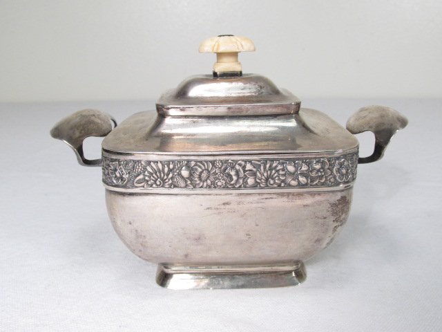 RUSSIAN SILVER & IVORY LIDDED SUGAR DISH: Russian silver lidded sugar dish with a carved ivory finial on the lid and embossed band. Gold washed interior, touch marks to lid as well as base. Stamped on base with various Russian hallmarks, incl