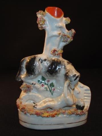 ENGLISH STAFFORDSHIRE SPILL VASE: DOG SAVING GIRL: English Staffordshire pearlware spill vase circa the early 19th century. Vase depicts a dog saving a young girl. Condition: two colored chips to vase rim, minor paint loss as expected, see images. Mea