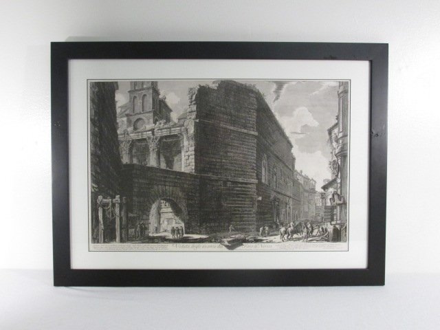 FRAMED ETCHING AFTER GIOVANNI PIRANESI: Framed etching after Giovanni Battista Piranesi, titled "Veduta delgi avanzi del Foro di Nerva". Matted and behind acrylic in a black finish frame. Condition: good, very minor wear to edges of frame, 