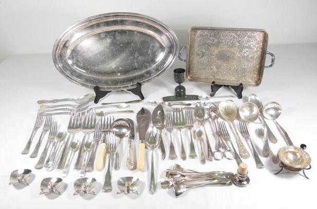 LOT OF ASSORTED SILVER PLATED TABLEWARES: Lot of assorted silver plated tablewares. Includes mostly utensils, but also a 16.25" tray and a 12.25" handled tray. Condition: usual signs of wear and age to finishes, scratches and dents, etc, see 
