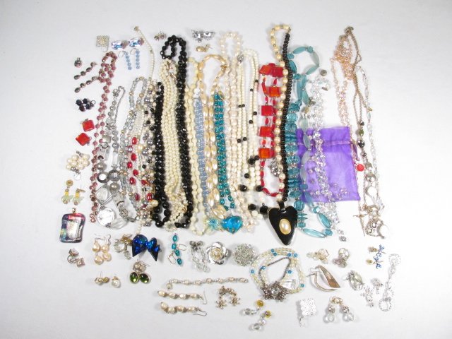 TRAY LOT ASSORTED LADIES COSTUME JEWELRY: SWAROVSKI,: Tray lot of assorted ladies costume jewelry. Includes name brands such as Swarovski, Mayan Art, Napier, and many more. Materials include sterling silver, glass, beads, faux pearls, faux gems, semi pre
