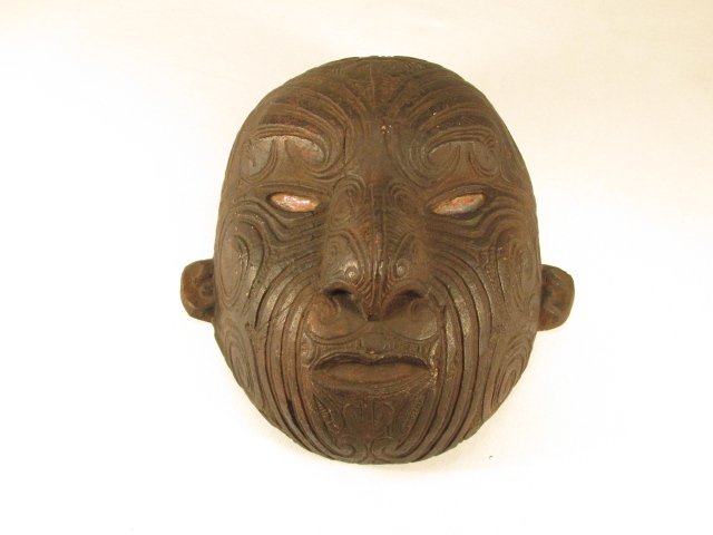 MAORI NEW ZEALAND MASK: Maori molded mask with inset abalone shell eyes. Measures 9" x 10". Condition good. Weight 2.2 lbs.