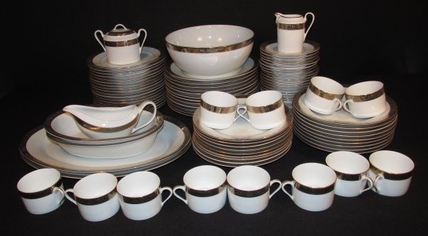 PHILIPPE DESHOULIERES "ORLEANS" SERVICE FOR TWELVE: Philippe Deshoulieres porcelain dinnerware service for twelve in the "Orleans" pattern. Includes (12) 10.3" plates, (12) 9" wide soup bowls, (24) 8.75" plates, (12) 4" wide cups, (12) 6" saucers, (12)