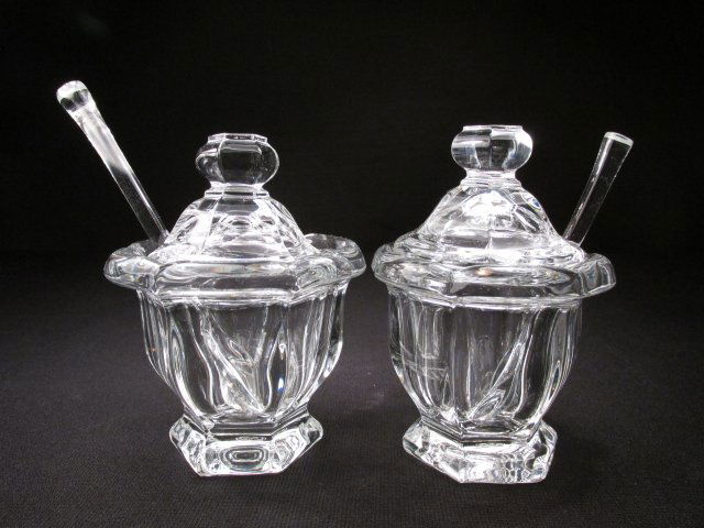 PAIR BACCARAT "BRETAGNE" CRYSTAL MUSTARD JARS & SPOONS: Pair of Baccarat crystal mustard jars with spoons in the "Bretagne" pattern. Both the jars and spoons are acid etched with circular Baccarat maker's mark. Each jar measures 4.5" tall to top of lid. Sp