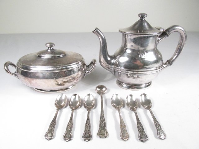 ASSORTED PENNSYLVANIA RAILROAD SILVER PLATED TEAPOT,: Lot of assorted Pennsylvania Railroad Railwayana silver plate. All pieces marked with "PRR" monogram. Includes a 6.5" tall teapot by Reed & Barton, a 7.75" wide covered dish by Rowley & Co, (6) 4.25" 
