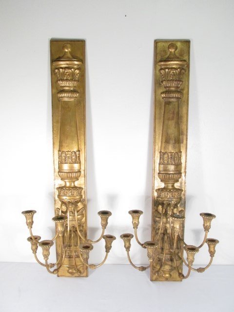 PAIR VINTAGE PALLADIO GILDED WALL SCONCES: Pair of vintage gilded metal sconces by Palladio. Each measures 37.5" tall and is marked with paper label, as well as stamped "Palladio" on verso. Each sconces holds seven candles. Condition: very min