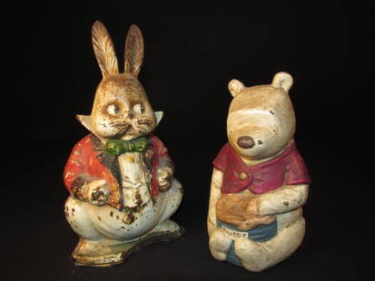 VINTAGE PAINTED CAST IRON FIGURAL DOOR STOPS: Vintage painted cast iron figural door stops: Gentleman Rabbit and Winnie the Pooh. Condition: Both stops show paint wear and Gentleman Rabbit has loss base, see images. Measurement: Rabbit - 9"