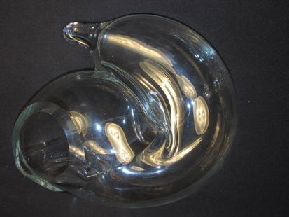 JOHN BINGHAM AMORPHIC GLASS SCULPTURE: John Bingham amorphic glass sculpture. Signed near rim "John Bingham (C)". Measures 7" tall x approx. 12.5" long. Condition: good but for one tiny flake to rim opposite signature, see images. Weight: